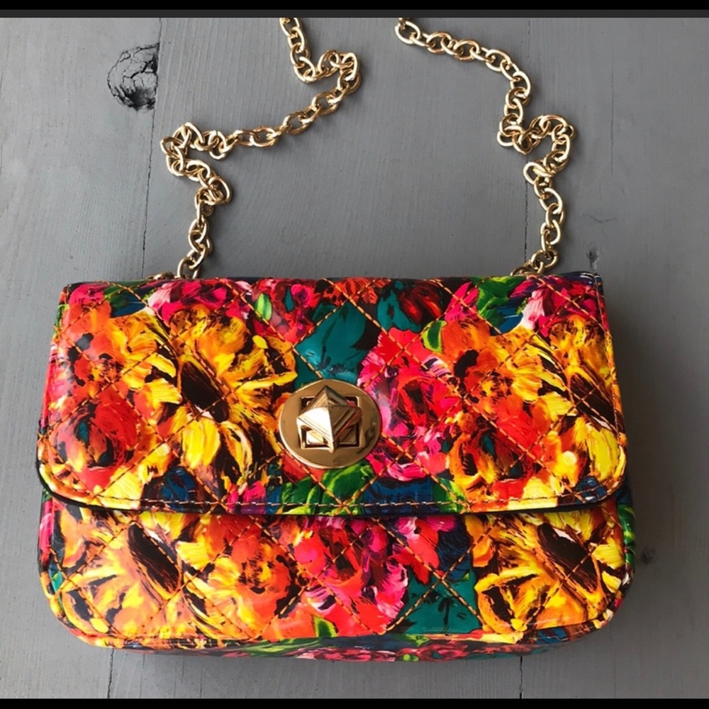 Small, floral, cross body purse.